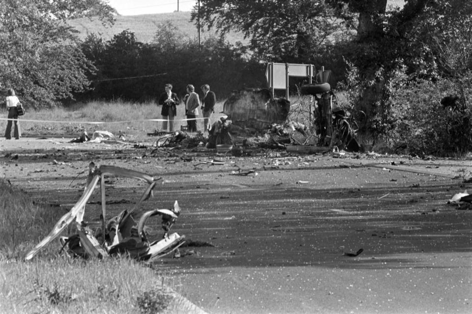 RUC detectives examining the scene of The Miami Showband Massacre on the morning of July 31st, 1975